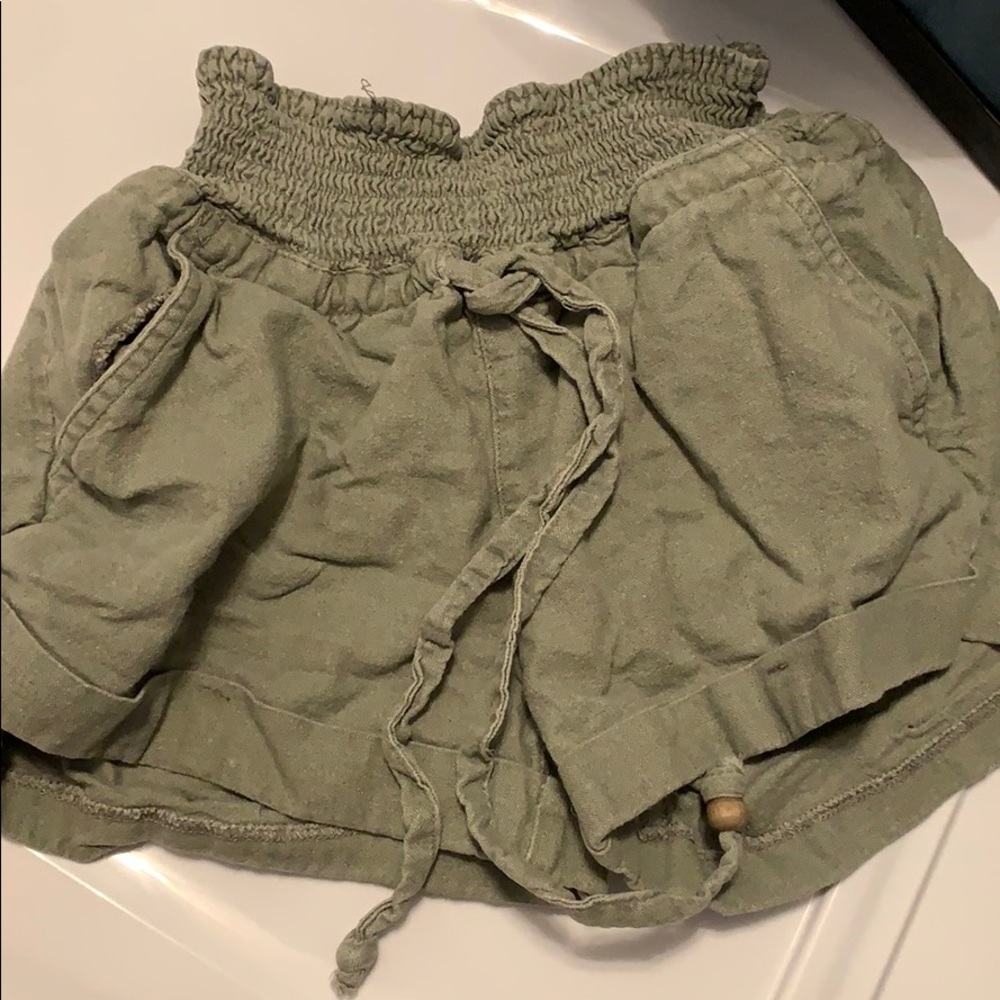 green shorts